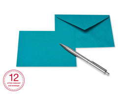 American Greetings comparación de tamaño junto a un bolígrafo, referencia clara de escala