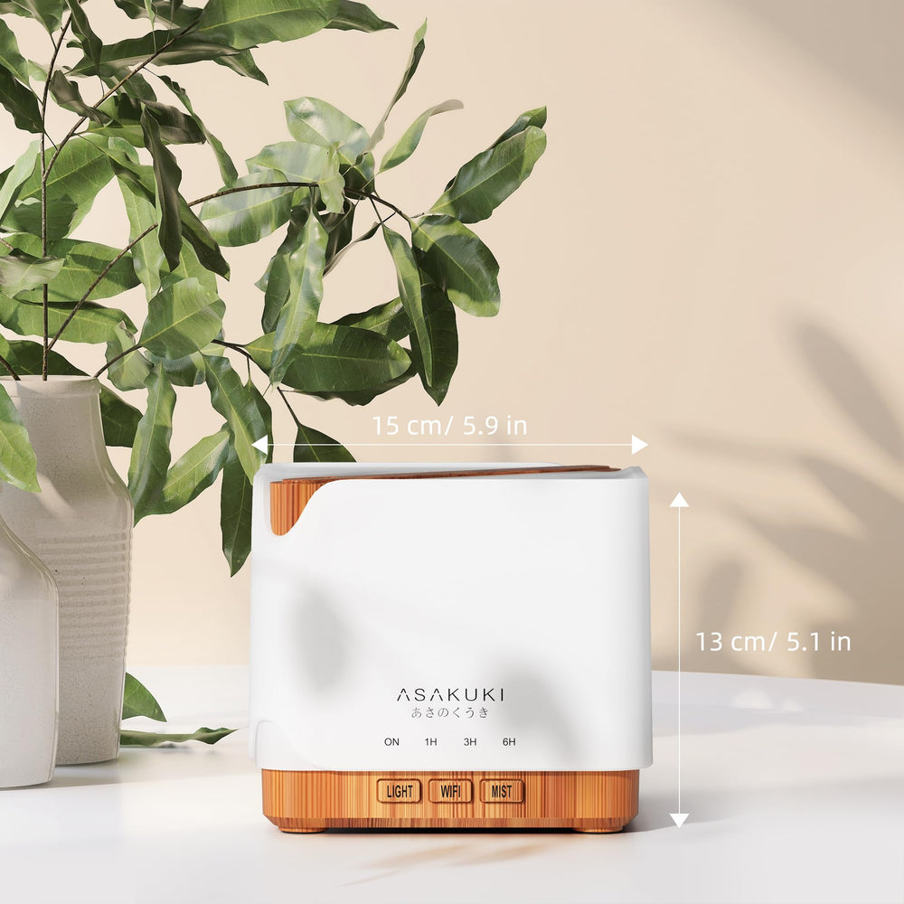 ASAKUKI difusor en una sala mostrando uso cotidiano y ambiente relajante