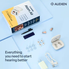 Audien Atom Air junto a moneda muestra tamaño compacto portátil