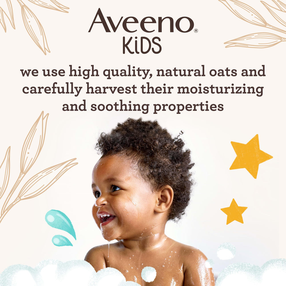 Aveeno Baby botella junto a un teléfono para comparar tamaño y capacidad útil