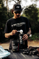 BARE PERFORMANCE NUTRITION atleta ciclista usando el producto durante entrenamiento intenso