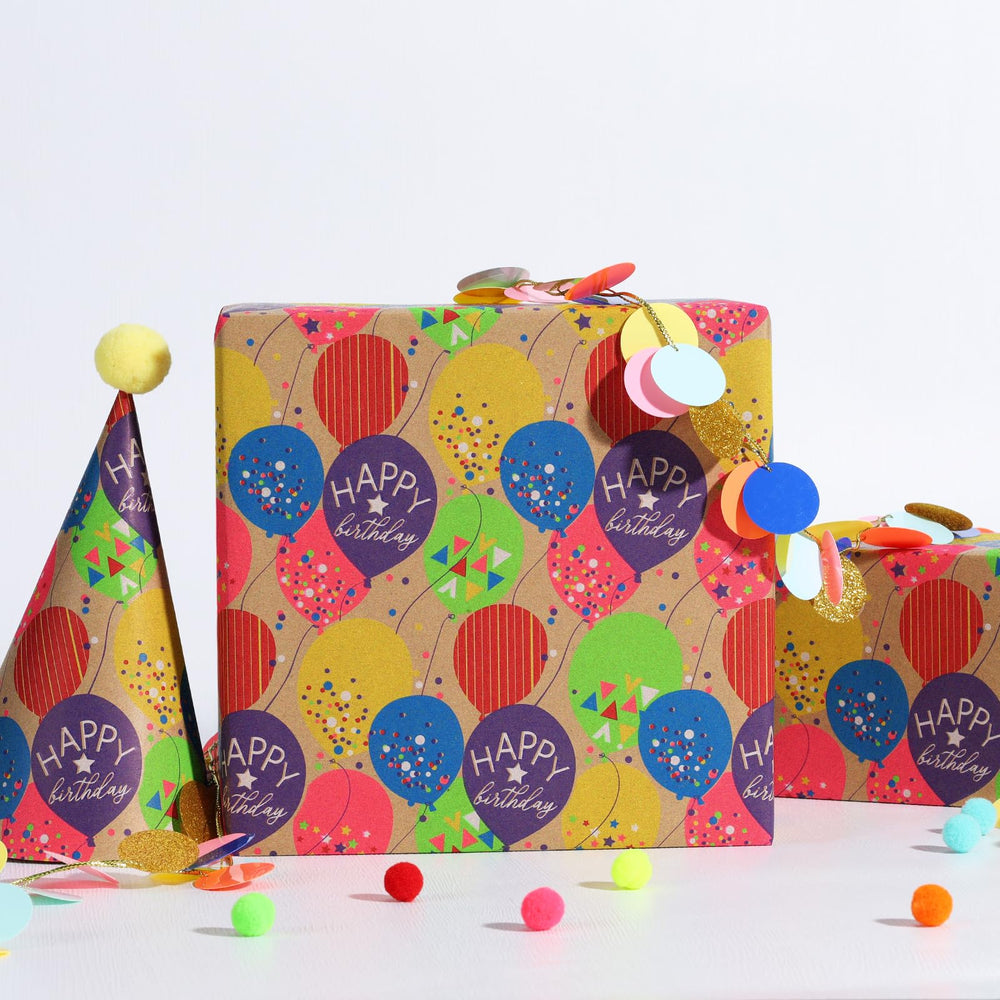 BIOBROWN regalo envuelto con el papel mostrando acabado limpio y profesional