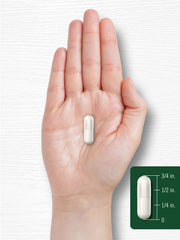 Tomando cápsula de apio Carlyle para apoyo diario.