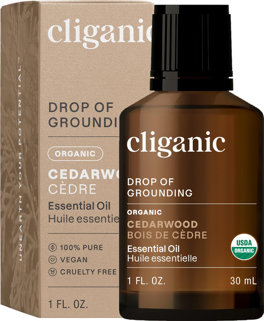 Cliganic aceite esencial de cedro orgánico, aroma terroso para ambientes tranquilos.