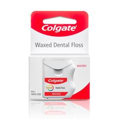Colgate hilo dental frente del paquete mostrando 2 unidades y beneficio frescura