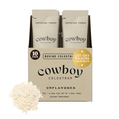 COWBOY COLOSTRUM envase frontal mostrando presentación y viaje