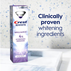 Crest tubo 3.8 oz junto a cepillo para referencia de tamaño