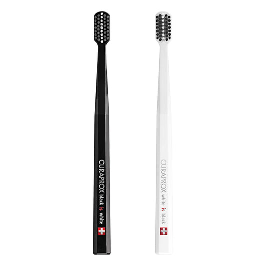 Curaprox pack frontal blanco y negro mostrando diseño y colores — limpieza confiable