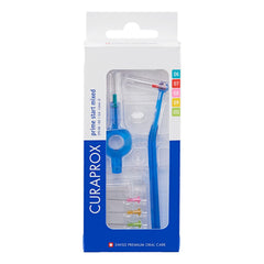 Curaprox set frontal con empaques y todos los cepillos visibles, limpieza precisa