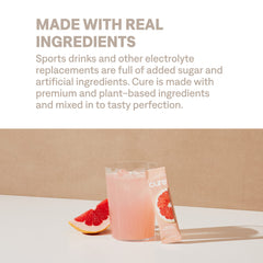 Cure Hydration sobre junto a una regla para comparar tamaño portátil