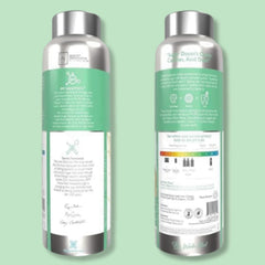 Botella Delsmile Elementa Silver junto a objetos para comparar tamaño
