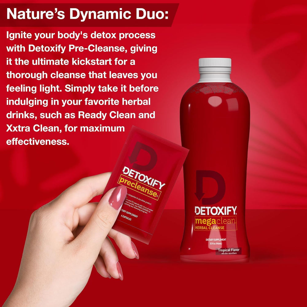 Detoxify Mega Clean botella junto a una mano para comparar tamaño y capacidad 32 oz