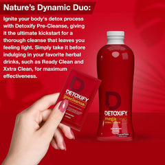 Detoxify Mega Clean botella junto a una mano para comparar tamaño y capacidad 32 oz