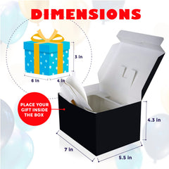 FETTIPOP caja junto a mano para comparar tamaño, escala práctica