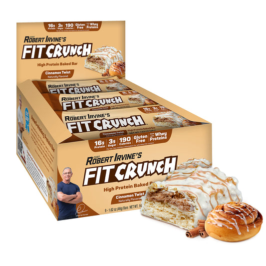 FitCRUNCH Snack Size Cinnamon Twist bar close-up showing soft cake core and protein-rich on-the-go snack.