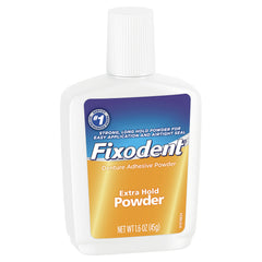 Close-up del polvo Fixodent mostrando textura fina y control de aplicación