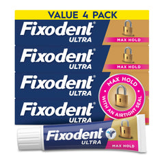Fixodent frente del paquete mostrando el pack de cuatro tubos y beneficio de suministro