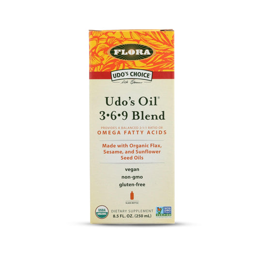 Flora Udos Omega 369: botella de vidrio oscuro para conservar frescura y nutrientes.