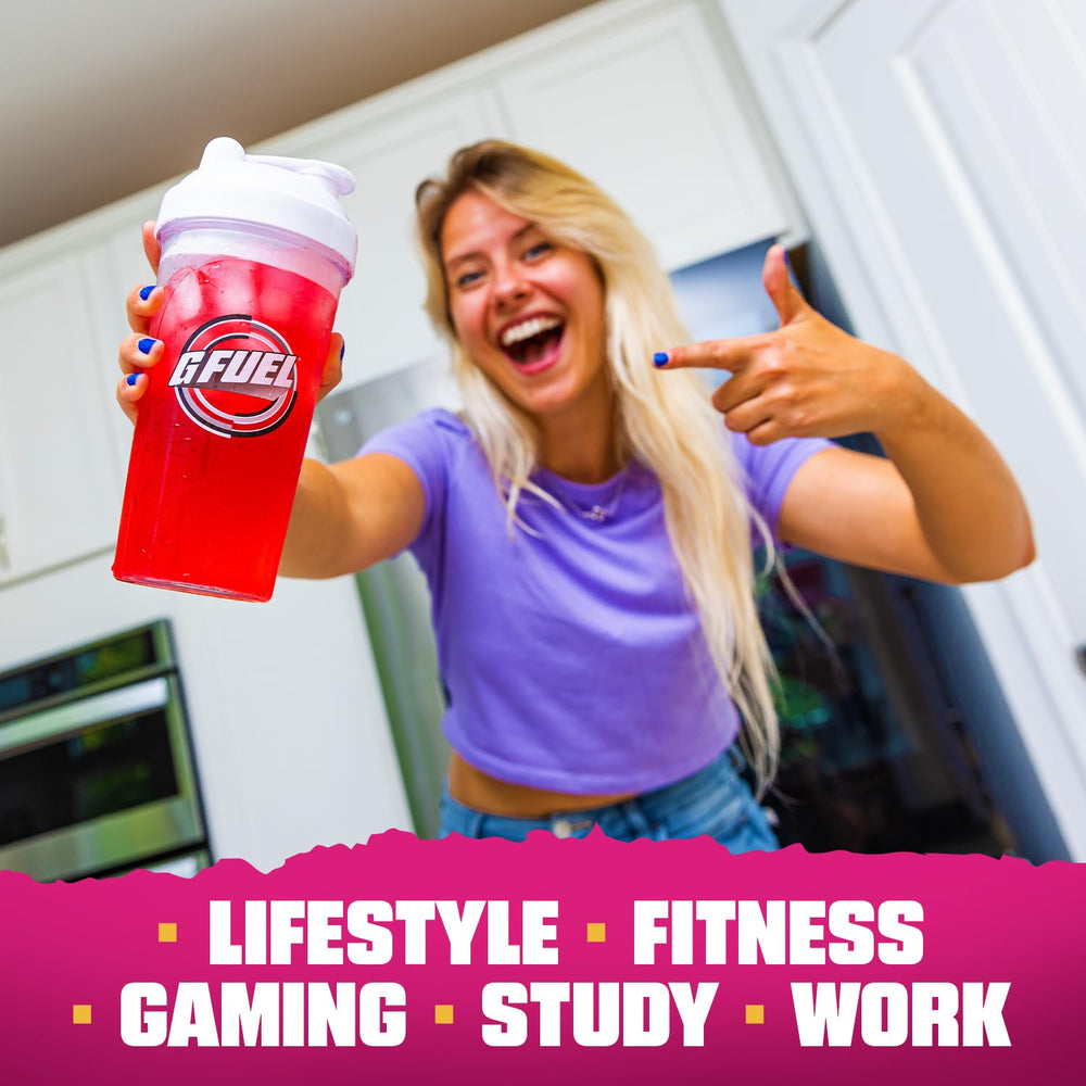 Jugador usando G Fuel Hype Sauce en setup de gaming para mayor enfoque