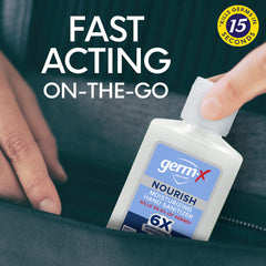 Germ-X aplicando gel en la mano para limpieza rápida
