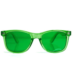 GloFX gafas verdes frontal mostrando diseño y beneficio anticontaminación lumínica