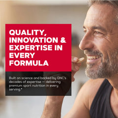 GNC Mega Men Sport junto a mano para comparar tamaño de cápsula práctico