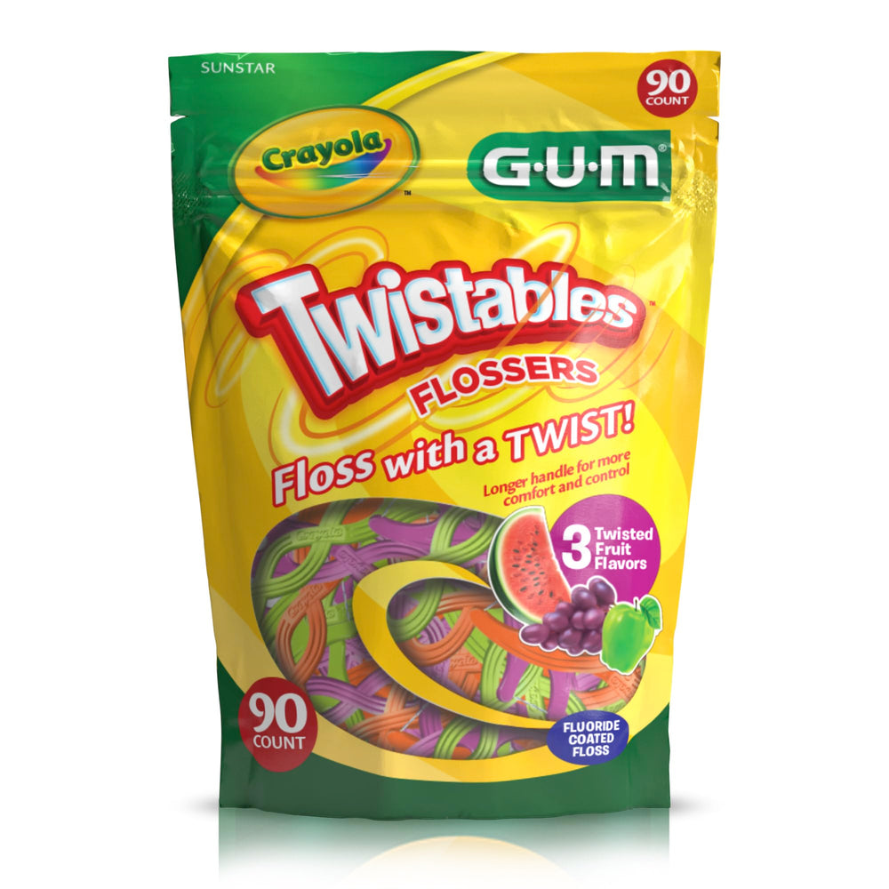 GUM Crayola comparación de tamaño del flosser junto a una mano de niño