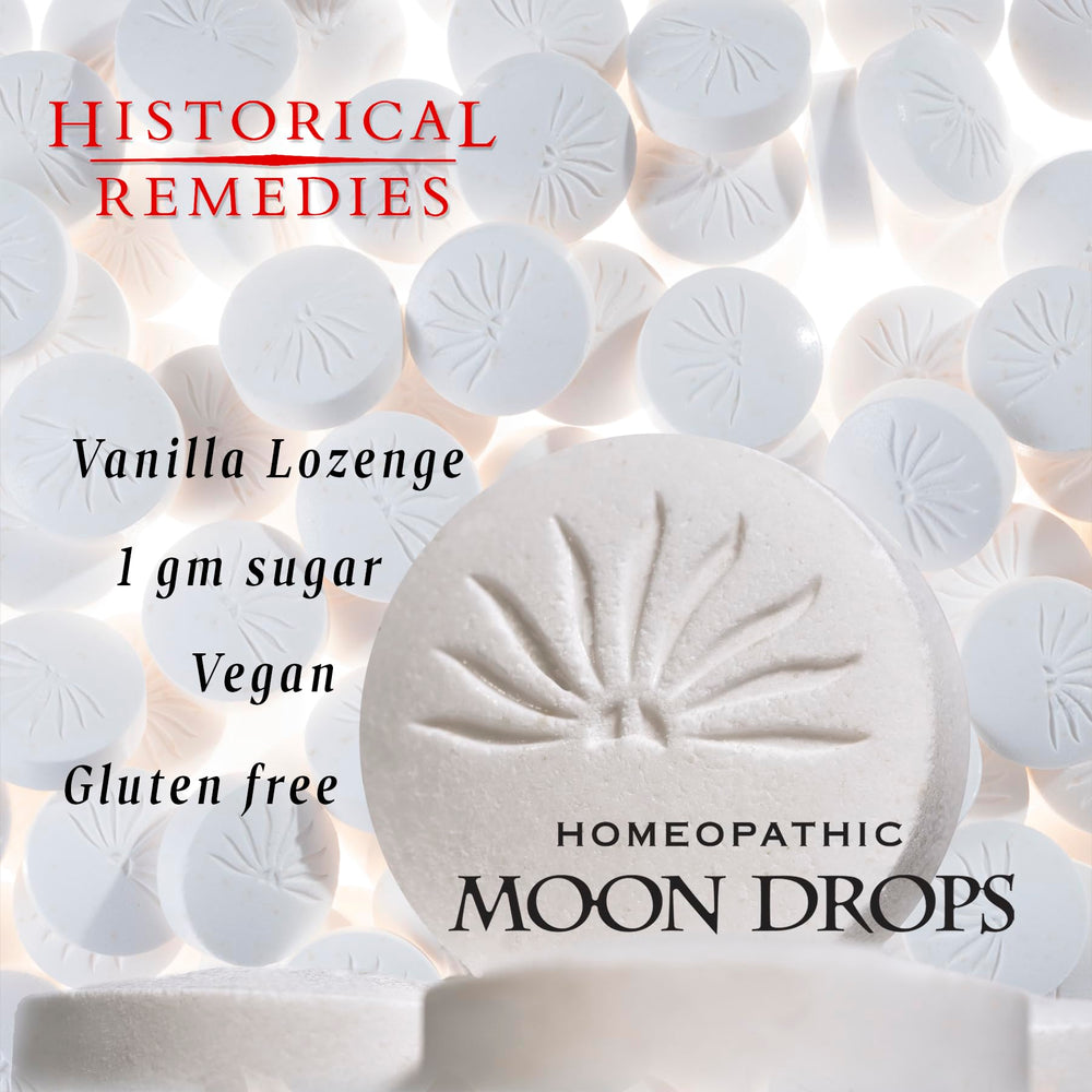 Historical Remedies Moon Drops primer plano de pastillas mostrando textura y color