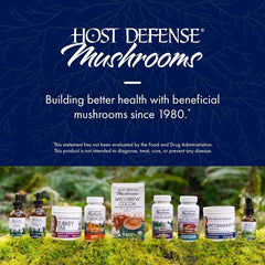 Host Defense frasco en entorno natural que sugiere origen orgánico