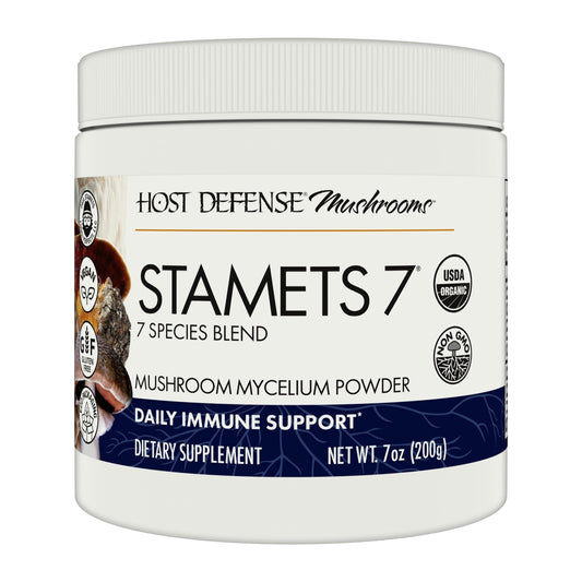 Host Defense envase frontal mostrando la marca y beneficio de apoyo inmunitario
