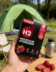HyAqua envase abierto con 60 unidades sobre mesa, presentación para consumo diario