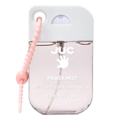 JUC Power Mist frontal mostrando el envase y llavero, fácil de llevar