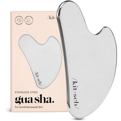 Kitsch gua sha plateado vista frontal, diseño ergonómico y acabado elegante