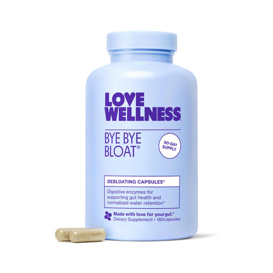 Love Wellness botella frontal mostrando la etiqueta y beneficio digestivo