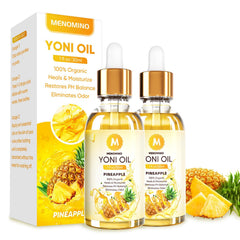 MENOMINO envase frontal del aceite Yoni piña mostrando tamaño compacto y diseño
