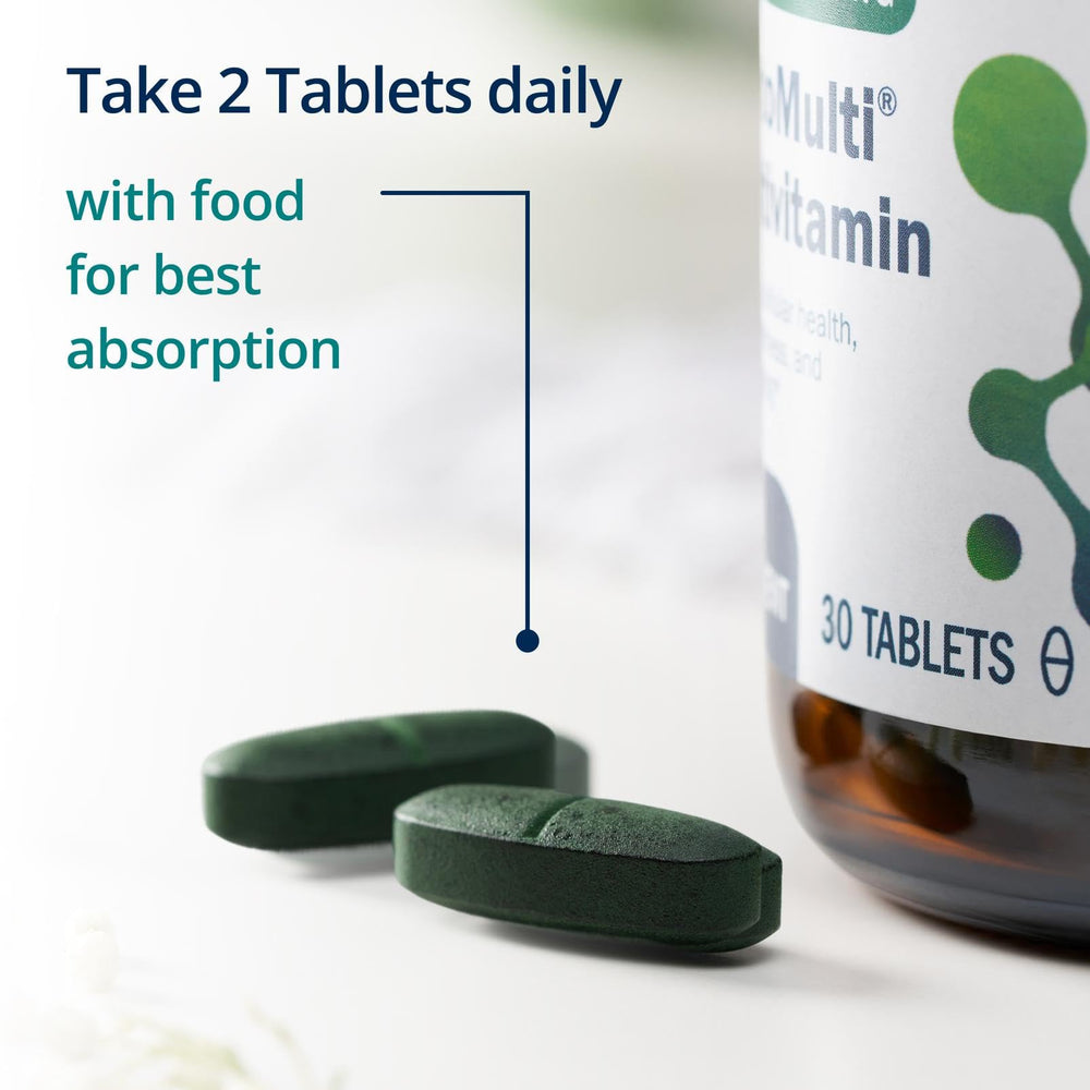 Metagenics tableta junto a una moneda para comparar tamaño real y manejo