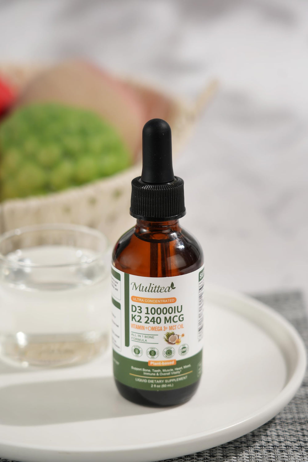 Mulittea D3 K2 líquido, coco MCT para mejor absorción.