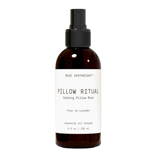 Muse Apothecary frasco frontal mostrando etiqueta elegante y beneficio relajante