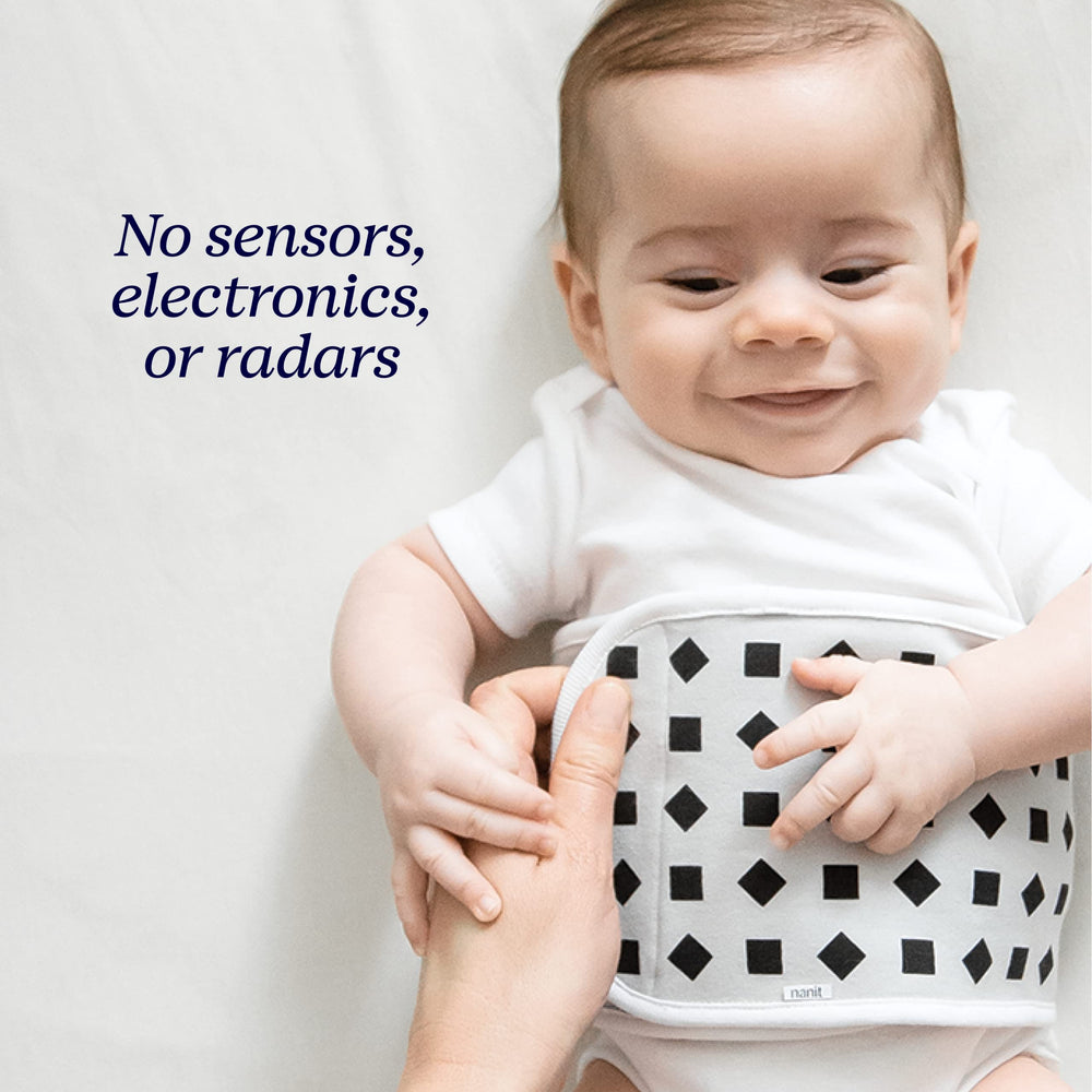 Nanit etiqueta de cuidados indicando lavado a máquina y durabilidad