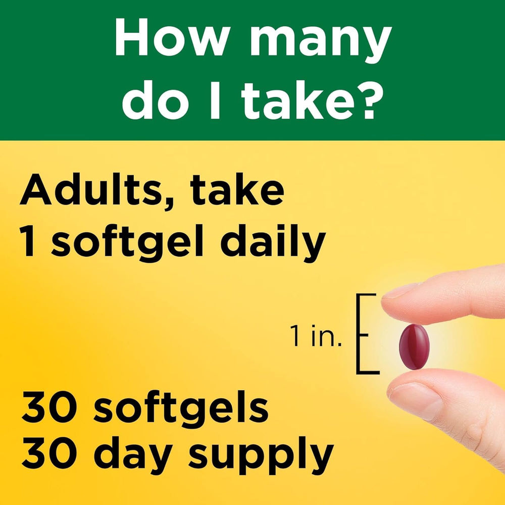 Nature Made cápsula sobre la mano para comparar tamaño y dosificación