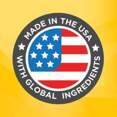 Frasco Nature Made Super B Complex en mano sugiere dosis diaria.