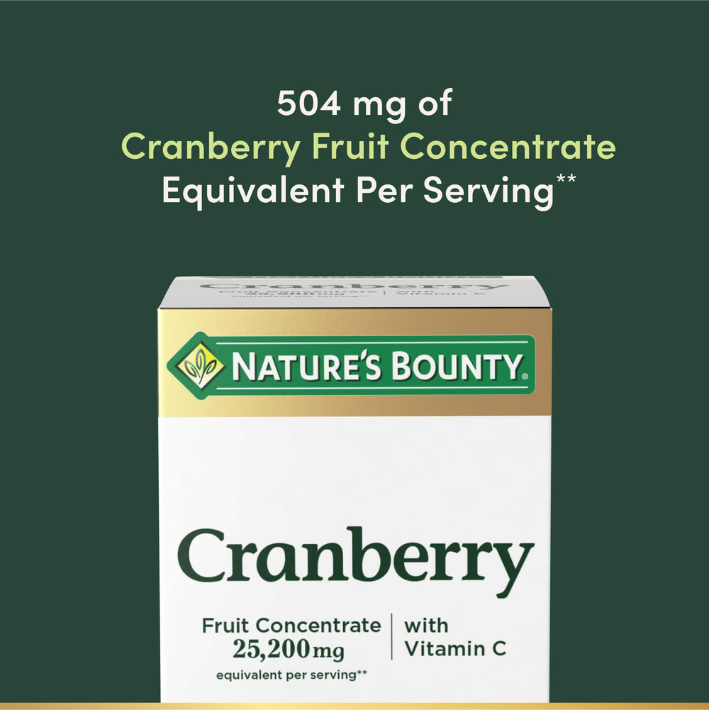 Nature's Bounty cápsulas en mano para comparar tamaño y dosificación