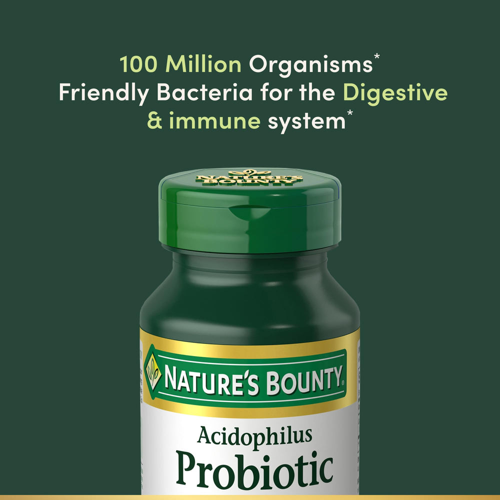 Nature's Bounty tableta en mano mostrando tamaño para dosificación diaria