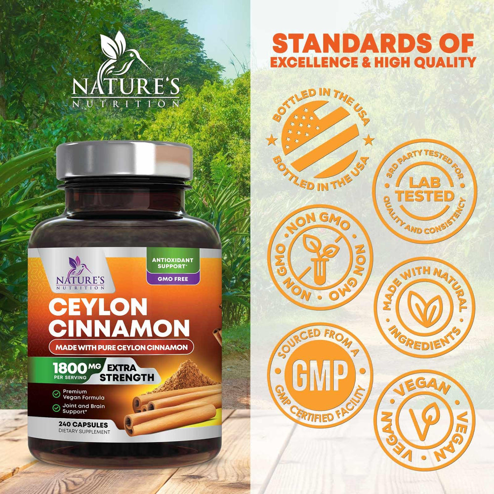 Nature's Nutrition cápsula en mano para comparar escala y facilidad de ingestión