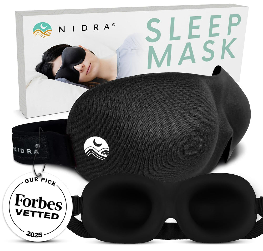 Mascara Nidra frontal en negro mostrando forma contorneada y beneficio de bloqueo total