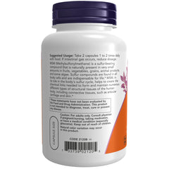 NOW Foods cápsula en mano para comparar tamaño y dosificación fácil
