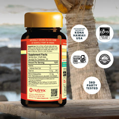 Nutrex Hawaii cápsula en mano mostrando tamaño fácil de tragar