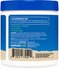 Nutricost Lion's Mane frasco al lado de una taza, muestra tamaño compacto