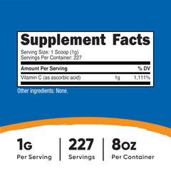 Nutricost detalle de la textura del polvo de vitamina C, apariencia fina y pura