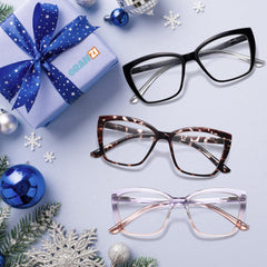 ORANZI gafas sobre escritorio con portátil demostrando protección en pantalla